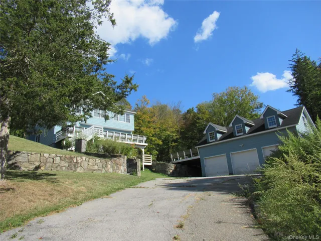 a sign that is on a brick wall