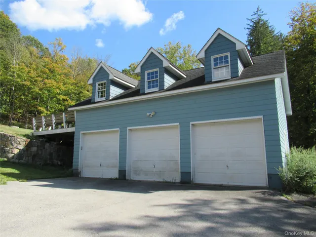 a front view of a house with a garage