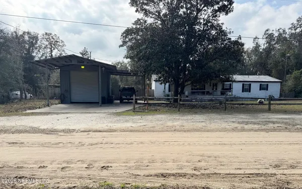 a house view with a outdoor space