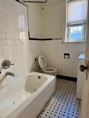 a bathroom with a sink and a bathtub