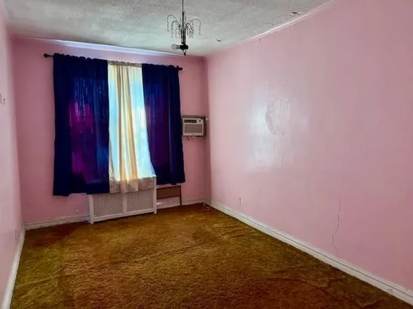 a view of an empty room with window