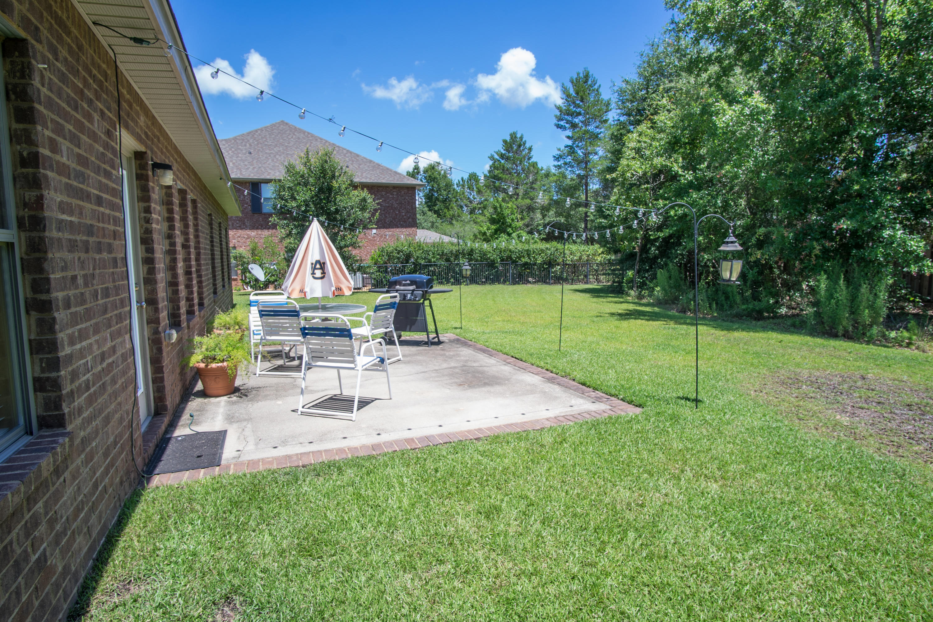 309 Whispering Way Freeport, FL 32439 - Photo 19 of 31 Backyard Patio (1 of 1)