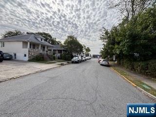 75 Cleveland Street Hackensack, NJ 07601 - Photo 8 of 12 a view of a car park in front of house