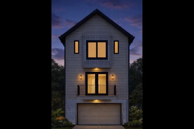 a front view of a house with large windows