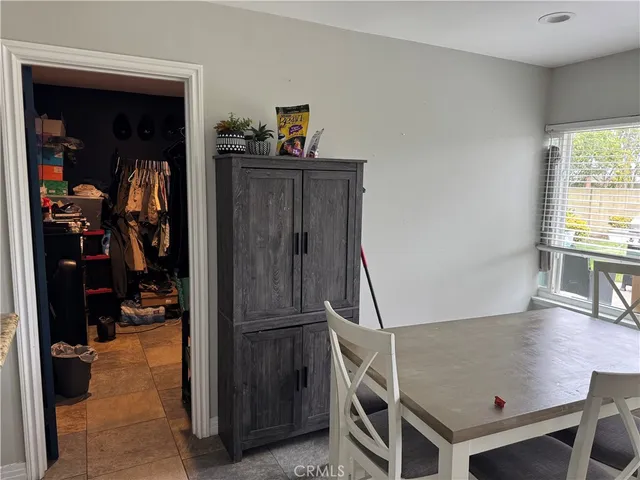 a view of a livingroom with furniture and storage