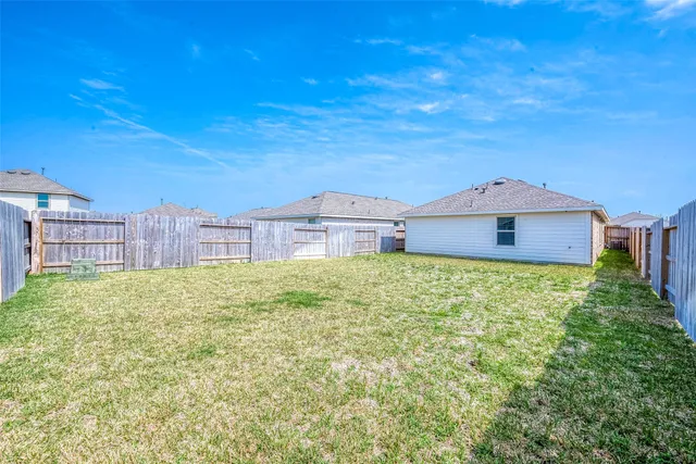 a house view with a garden space