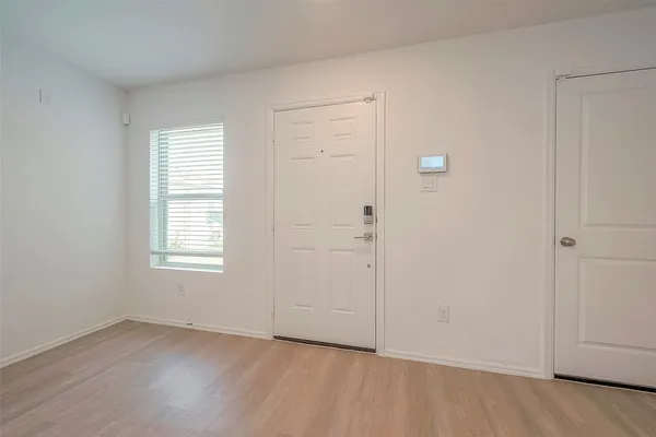 a view of a brick house with windows