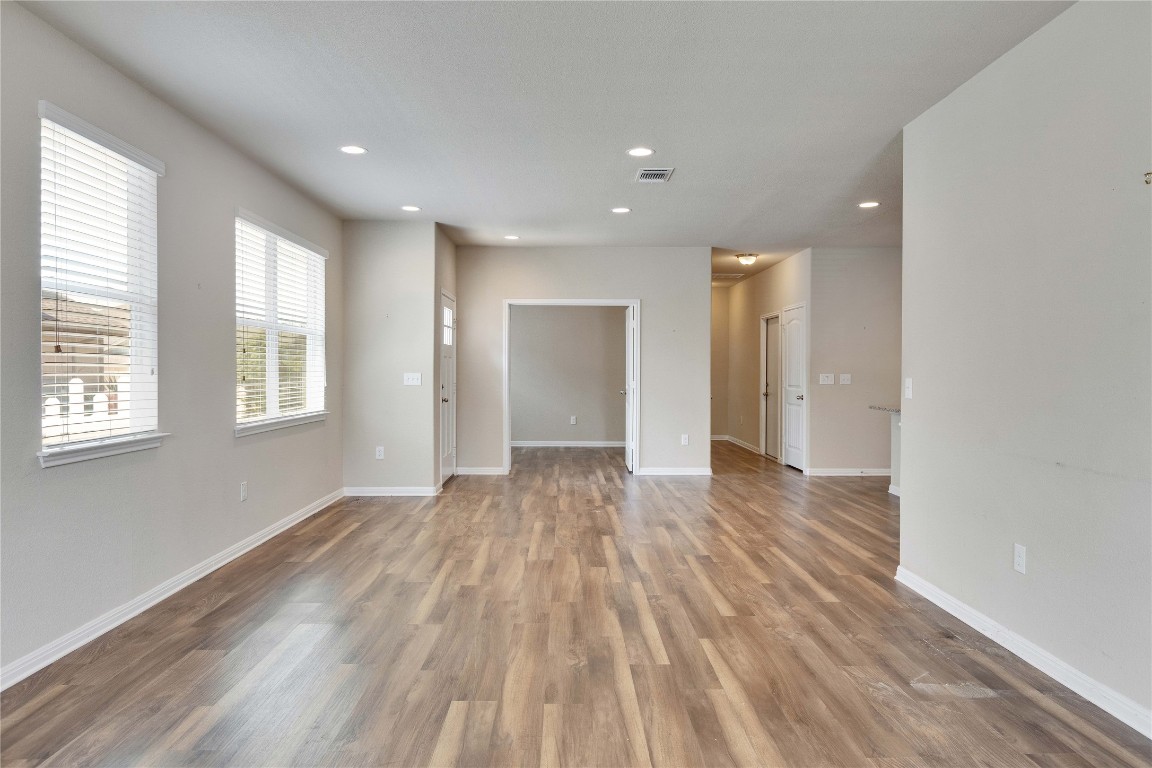 1701 Logan Drive, Unit 12 Round Rock, TX 78664 - Photo 10 of 26 a view of an empty room and glass door
