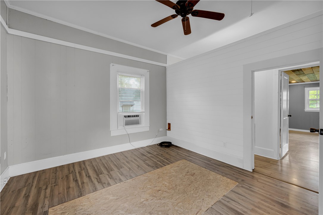 308 Verner Street Walhalla, SC 29691 - Photo 16 of 49 High ceilings and durable wood floors highlight this versatile room awaiting personal touch.