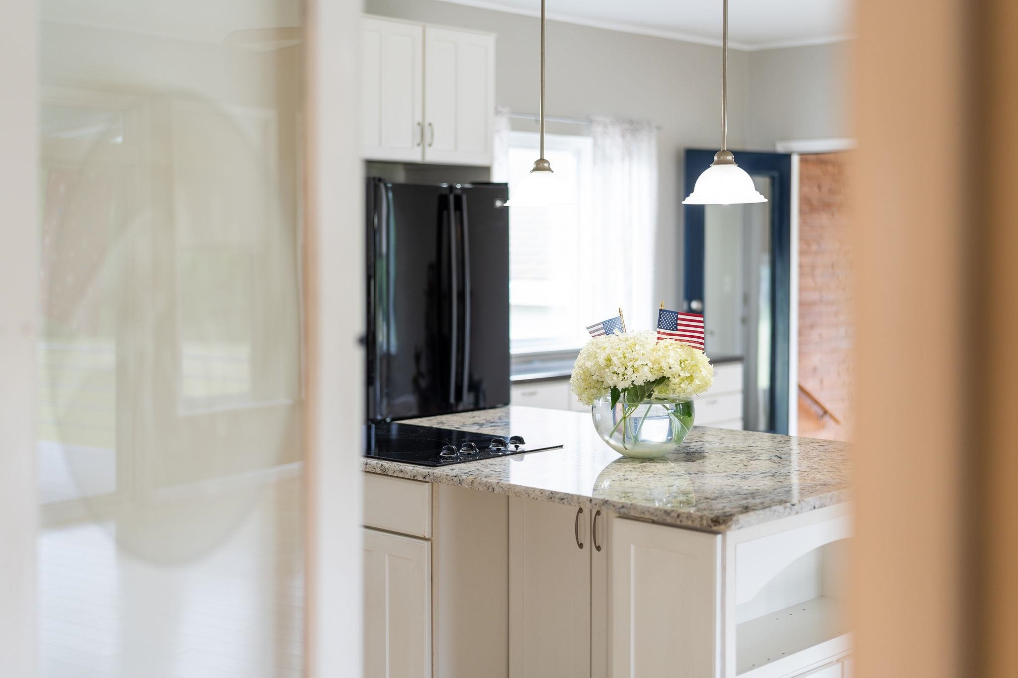 1373 Rockfish Road Waynesboro, VA 22980 - Photo 12 of 75 a kitchen with refrigerator and table