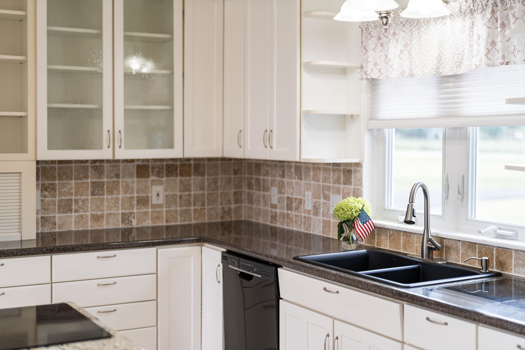 1373 Rockfish Road Waynesboro, VA 22980 - Photo 16 of 75 a kitchen with a sink and cabinets