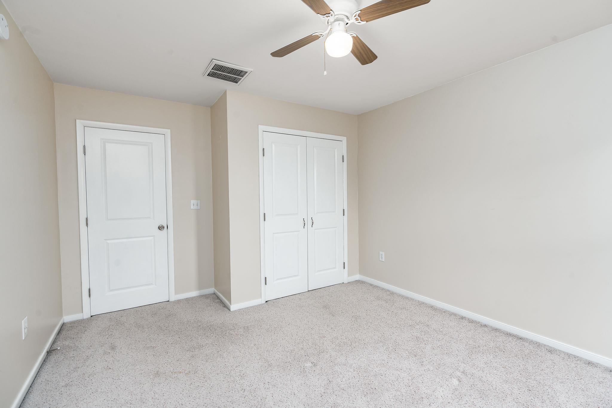 1373 Rockfish Road Waynesboro, VA 22980 - Photo 43 of 75 a view of an empty room and chandelier fan