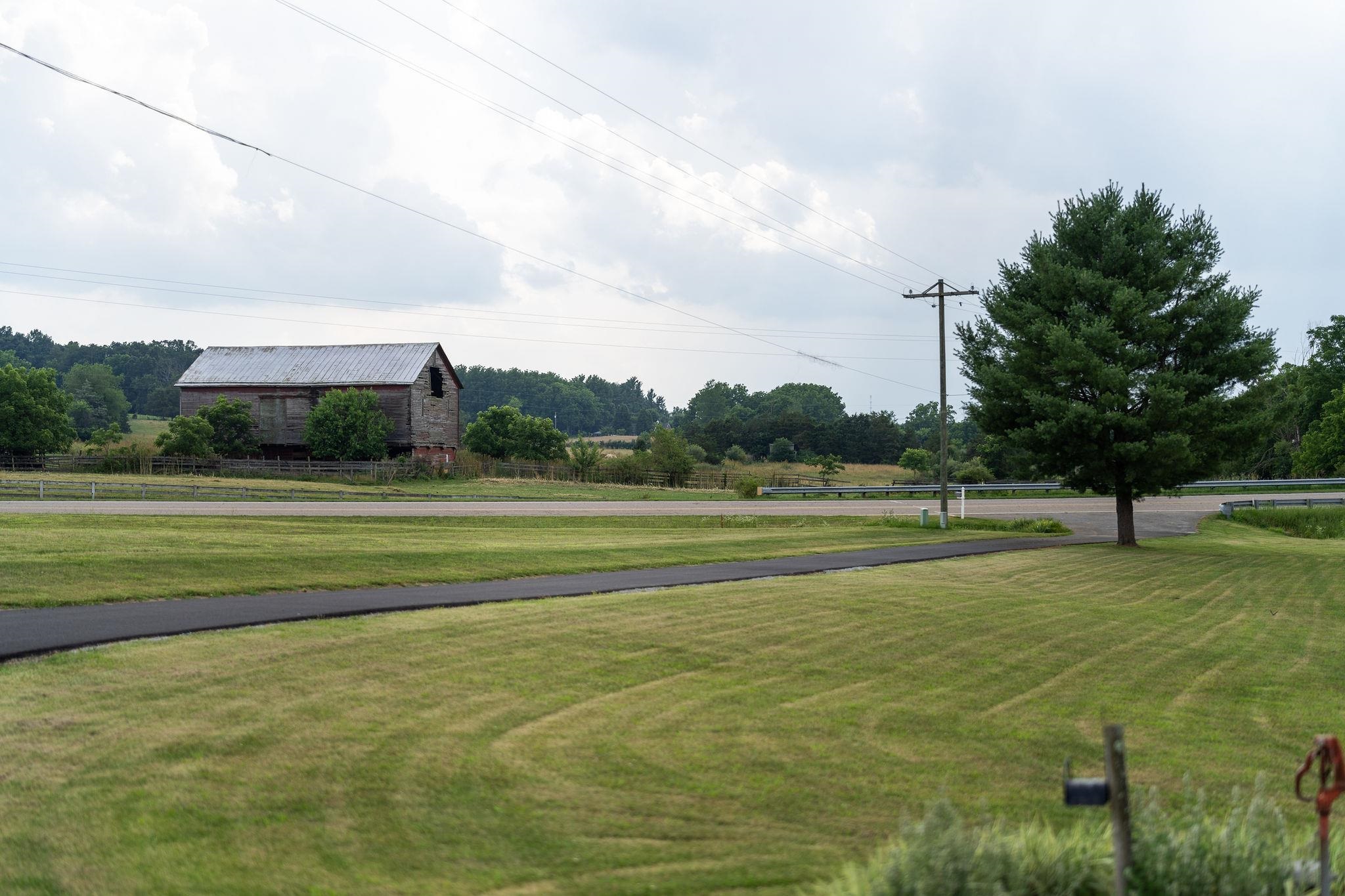 1373 Rockfish Road Waynesboro, VA 22980 - Photo 48 of 75 a view of a golf course with a lake