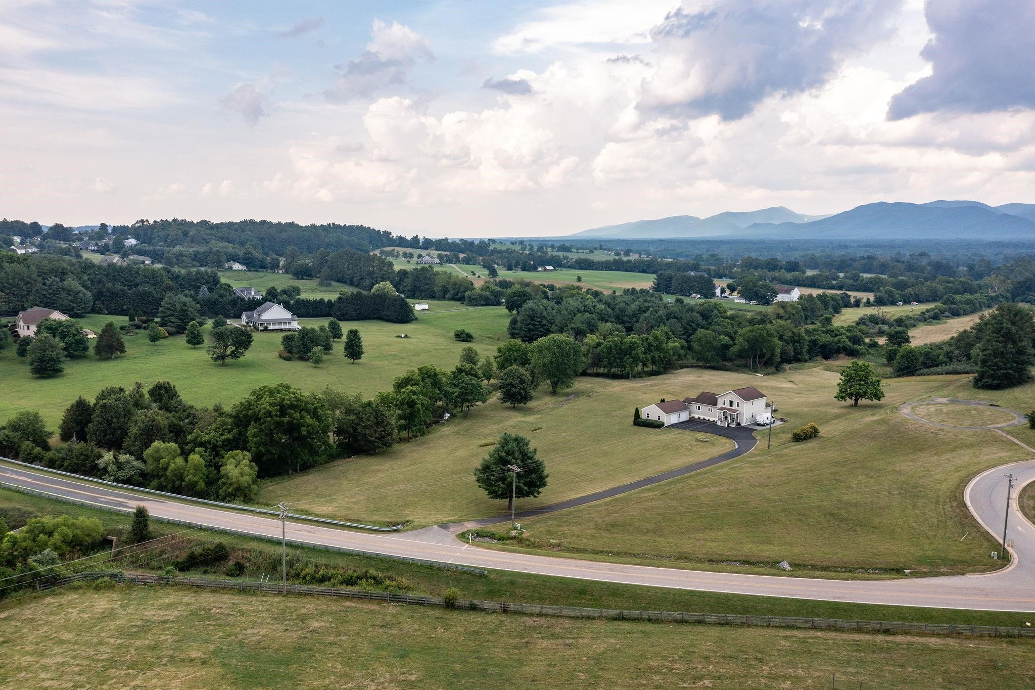 1373 Rockfish Road Waynesboro, VA 22980 - Photo 72 of 75 a view of a lake with huge green field