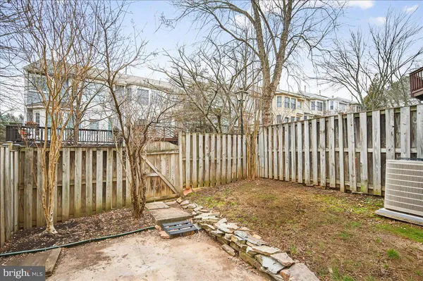 a view of a wooden fence