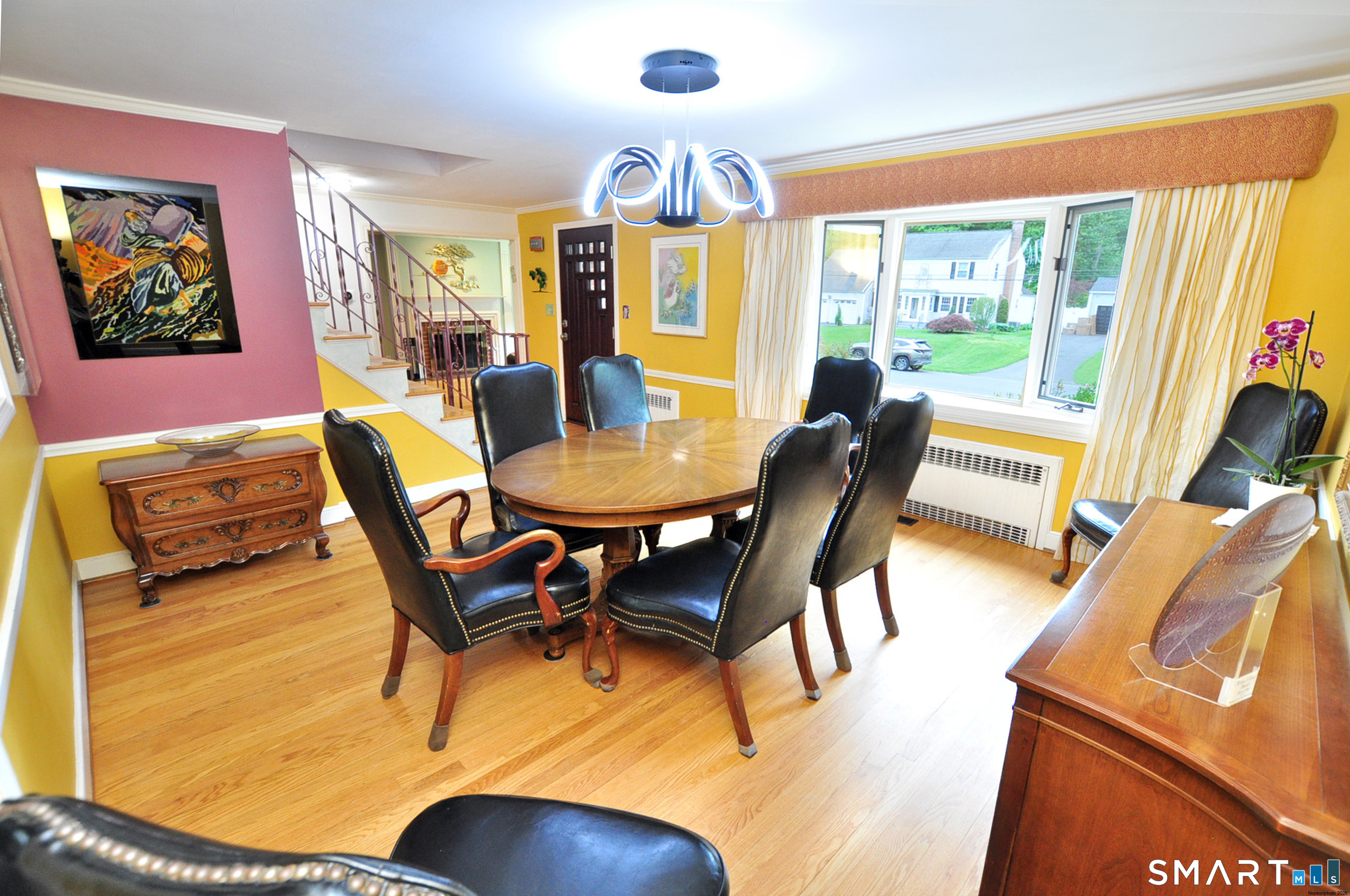 44 Miamis Road West Hartford, CT 06117 - Photo 9 of 39 a dining room with furniture and a large window