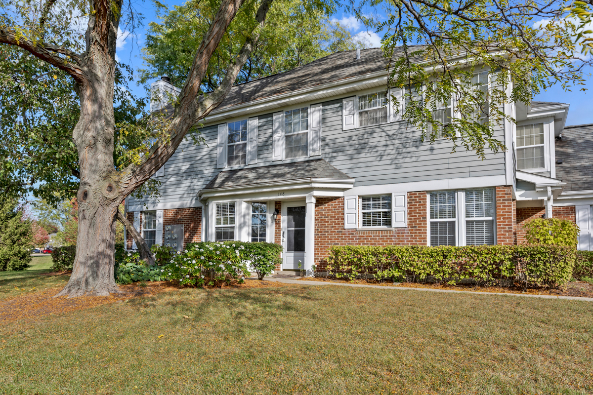 148 White Branch Court Buffalo Grove, IL 60089 - Photo 1 of 25 front view of a house with a garden
