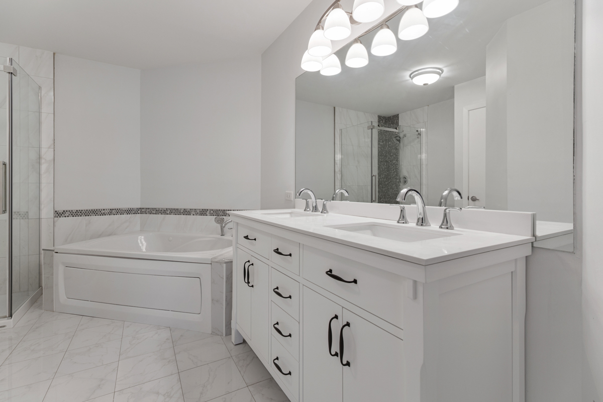 148 White Branch Court Buffalo Grove, IL 60089 - Photo 12 of 25 a bathroom with a sink a toilet and a mirror