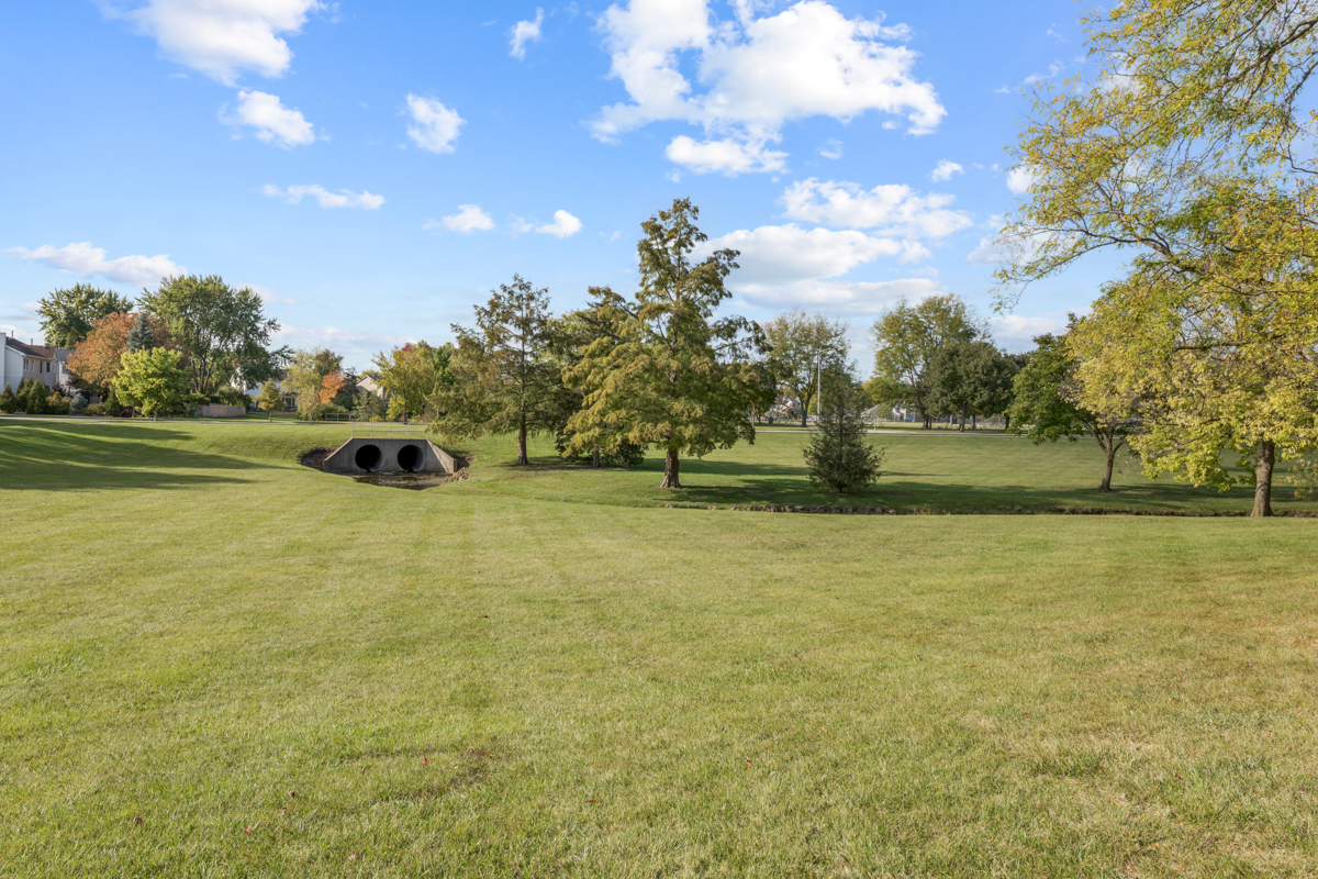 148 White Branch Court Buffalo Grove, IL 60089 - Photo 22 of 25 a view of outdoor space with deck and yard