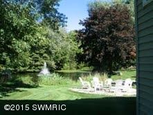 15001 Boom Road Spring Lake, MI 49456 - Photo 6 of 21 patio and pond