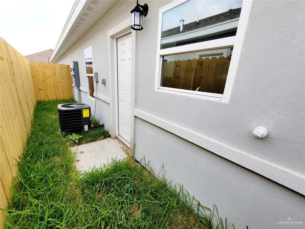 2109 Davenport Street, Unit 3 Weslaco, TX 78596 - Photo 5 of 15 a bathroom with a sink and mirror