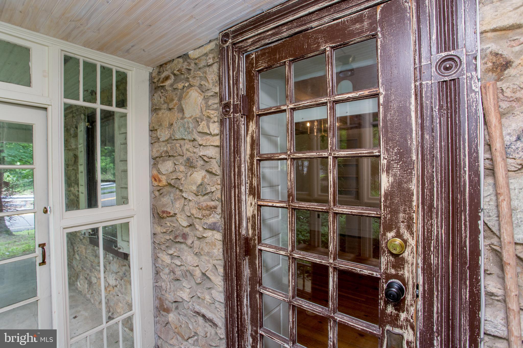 3115 Gallows Hill Road Riegelsville, PA 18077 - Photo 30 of 75 Glass porch on side of house
