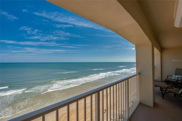 a view of ocean from a balcony