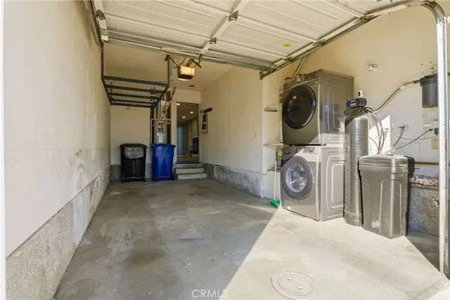 a view of a storage & utility room with washer and dryer