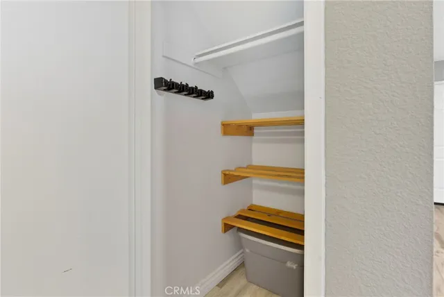 a bathroom with a window and a shower