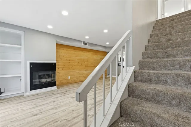 a view of entryway with wooden floor