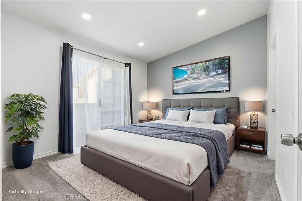 8594 Shramsburg Drive Rancho Cucamonga, CA 91730 - Photo 23 of 43 a bedroom with bed and a potted plant