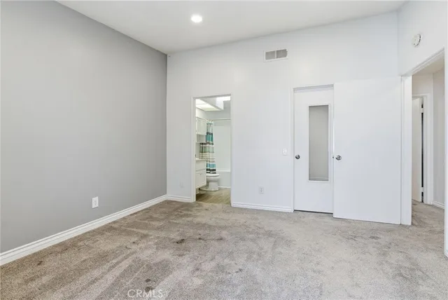 an empty room with an entryway
