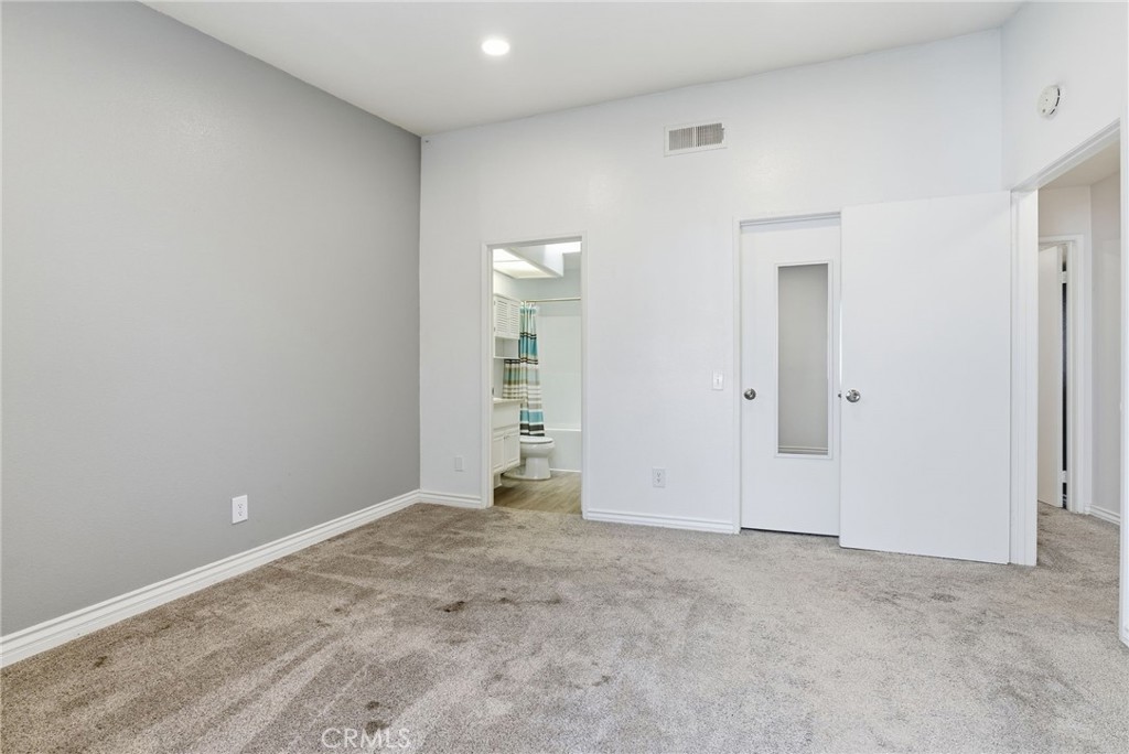 8594 Shramsburg Drive Rancho Cucamonga, CA 91730 - Photo 25 of 43 an empty room with an entryway