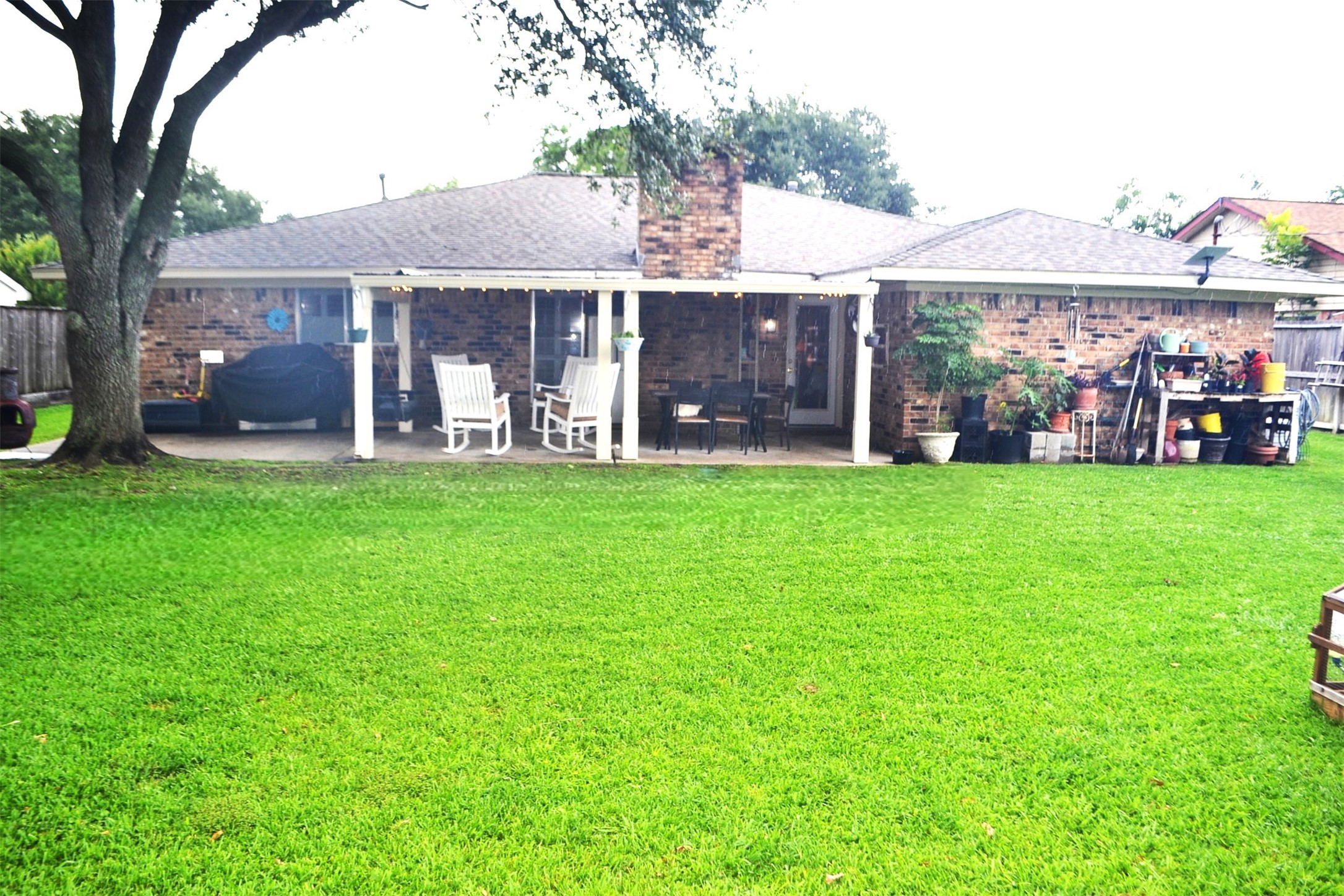 610 East X Street Deer Park, TX 77536 - Photo 40 of 44 a view of a house with a yard and sitting area