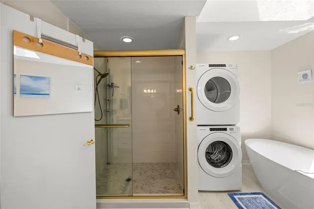 a bathroom with a washer and dryer