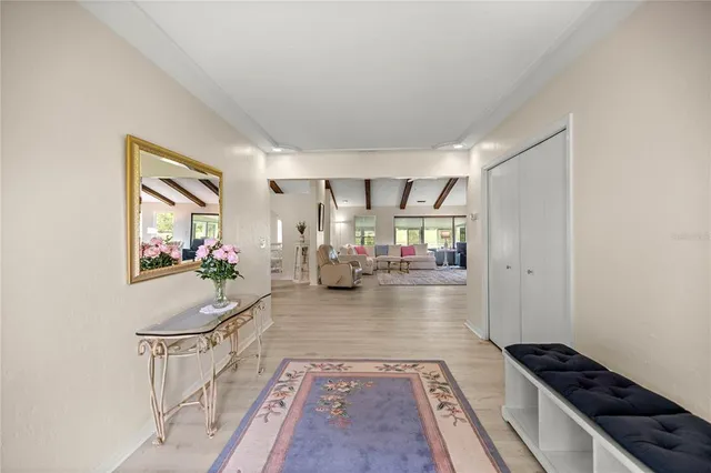 a living room with furniture and a rug