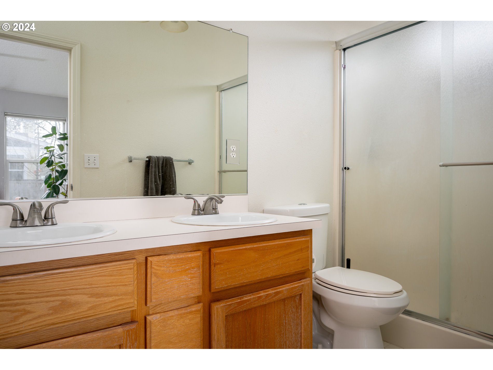 17818 Southwest Reisner Lane Sherwood, OR 97140 - Photo 13 of 20 a bathroom with a sink a toilet and mirror