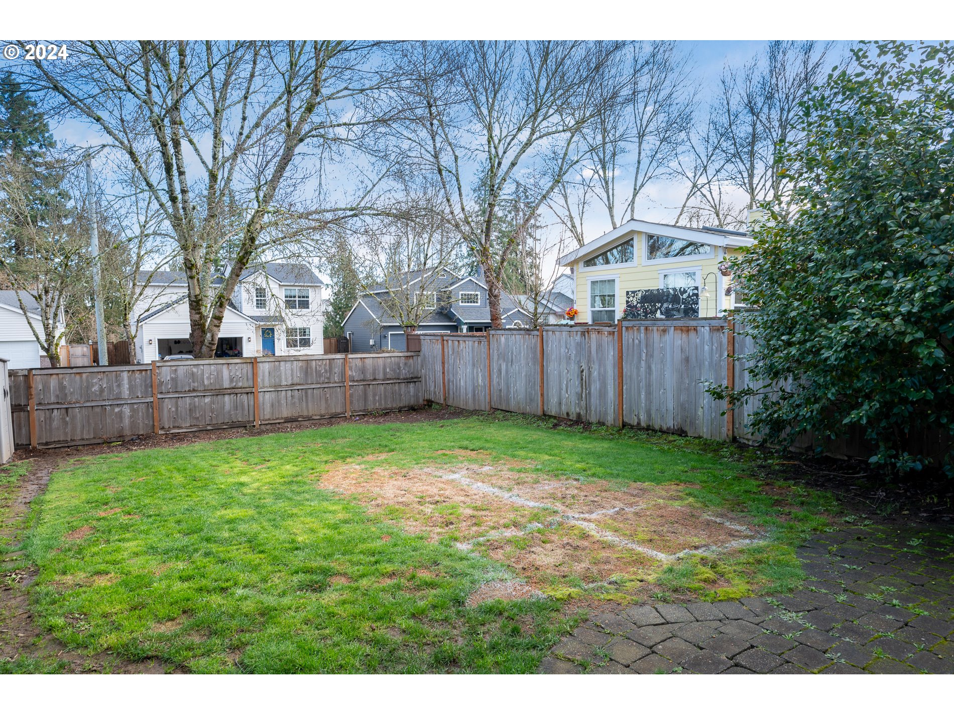 17818 Southwest Reisner Lane Sherwood, OR 97140 - Photo 19 of 20 a backyard of a house with lots of green space