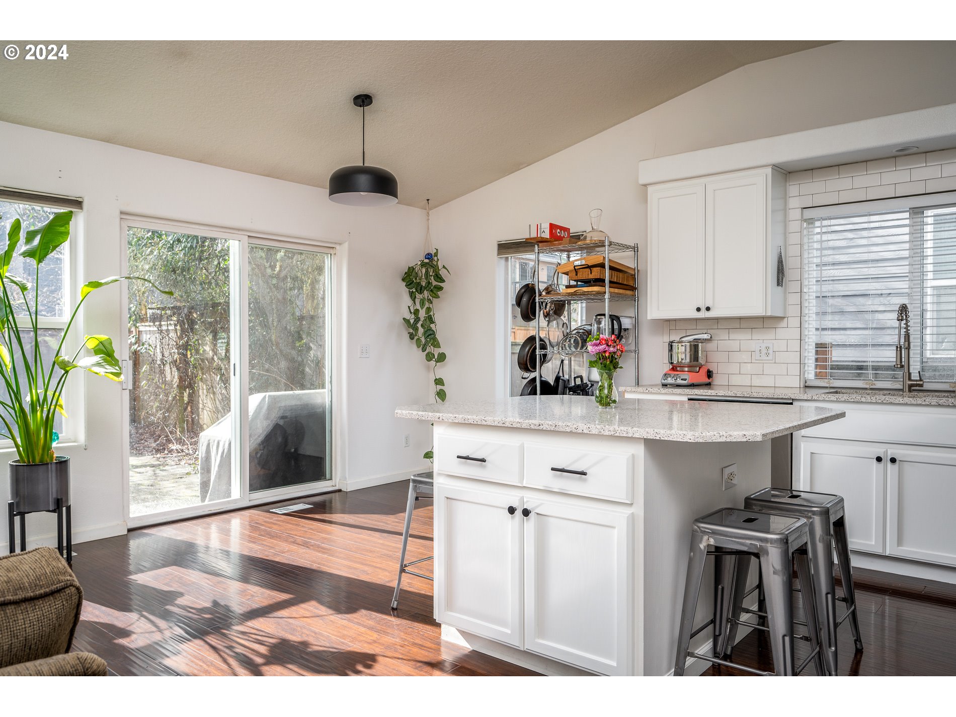 17818 Southwest Reisner Lane Sherwood, OR 97140 - Photo 5 of 20 a kitchen with stainless steel appliances granite countertop a stove a sink and a refrigerator