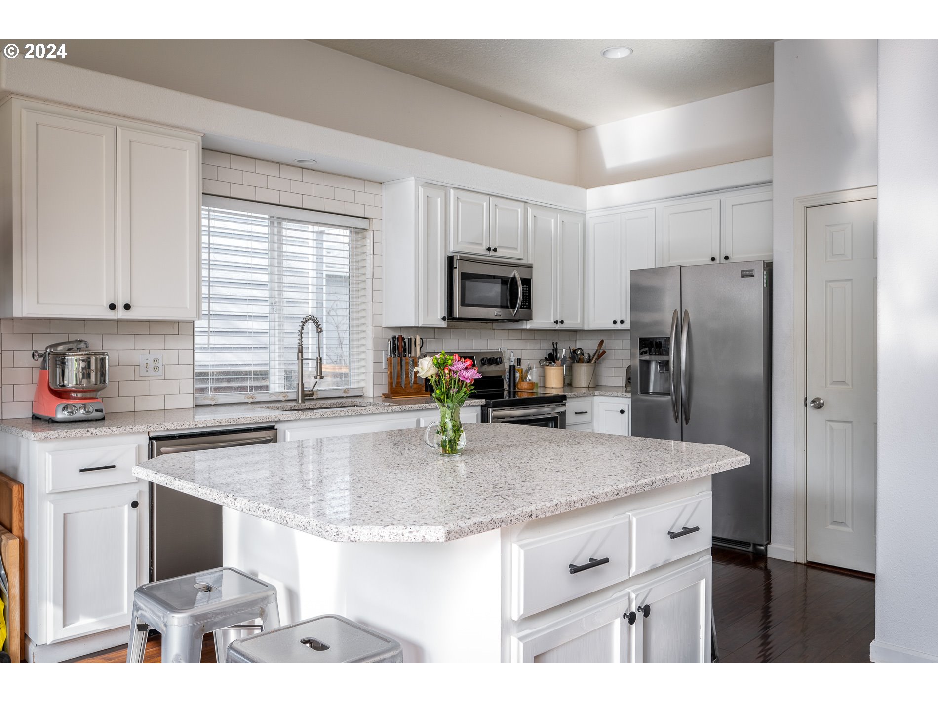 17818 Southwest Reisner Lane Sherwood, OR 97140 - Photo 6 of 20 a kitchen with granite countertop a refrigerator stove and sink