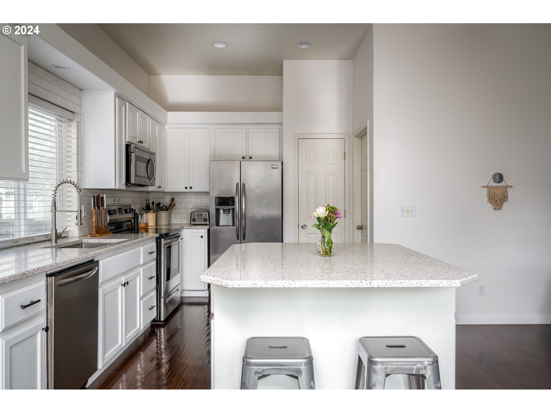 17818 Southwest Reisner Lane Sherwood, OR 97140 - Photo 7 of 20 a kitchen with stainless steel appliances a sink a refrigerator a stove a microwave and island