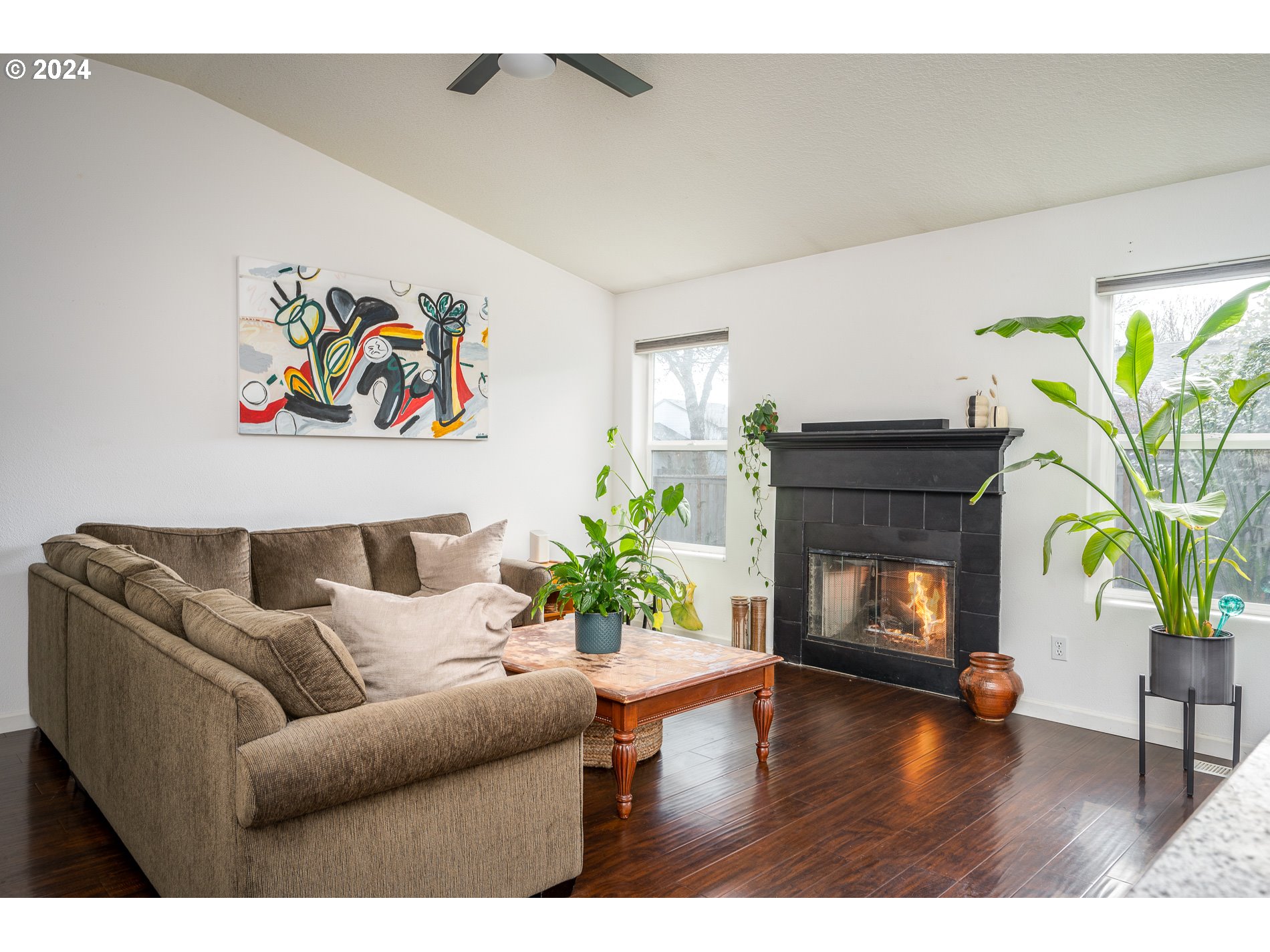 17818 Southwest Reisner Lane Sherwood, OR 97140 - Photo 9 of 20 a living room with furniture and a fireplace