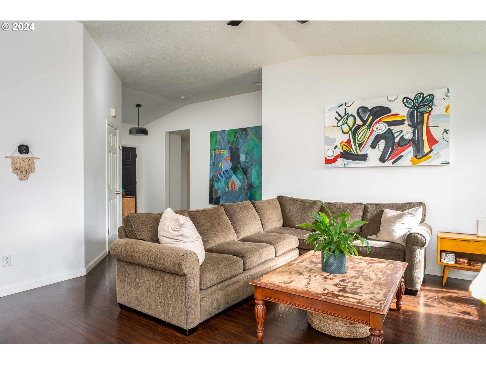 17818 Southwest Reisner Lane Sherwood, OR 97140 - Photo 10 of 20 a living room with furniture and a wooden floor