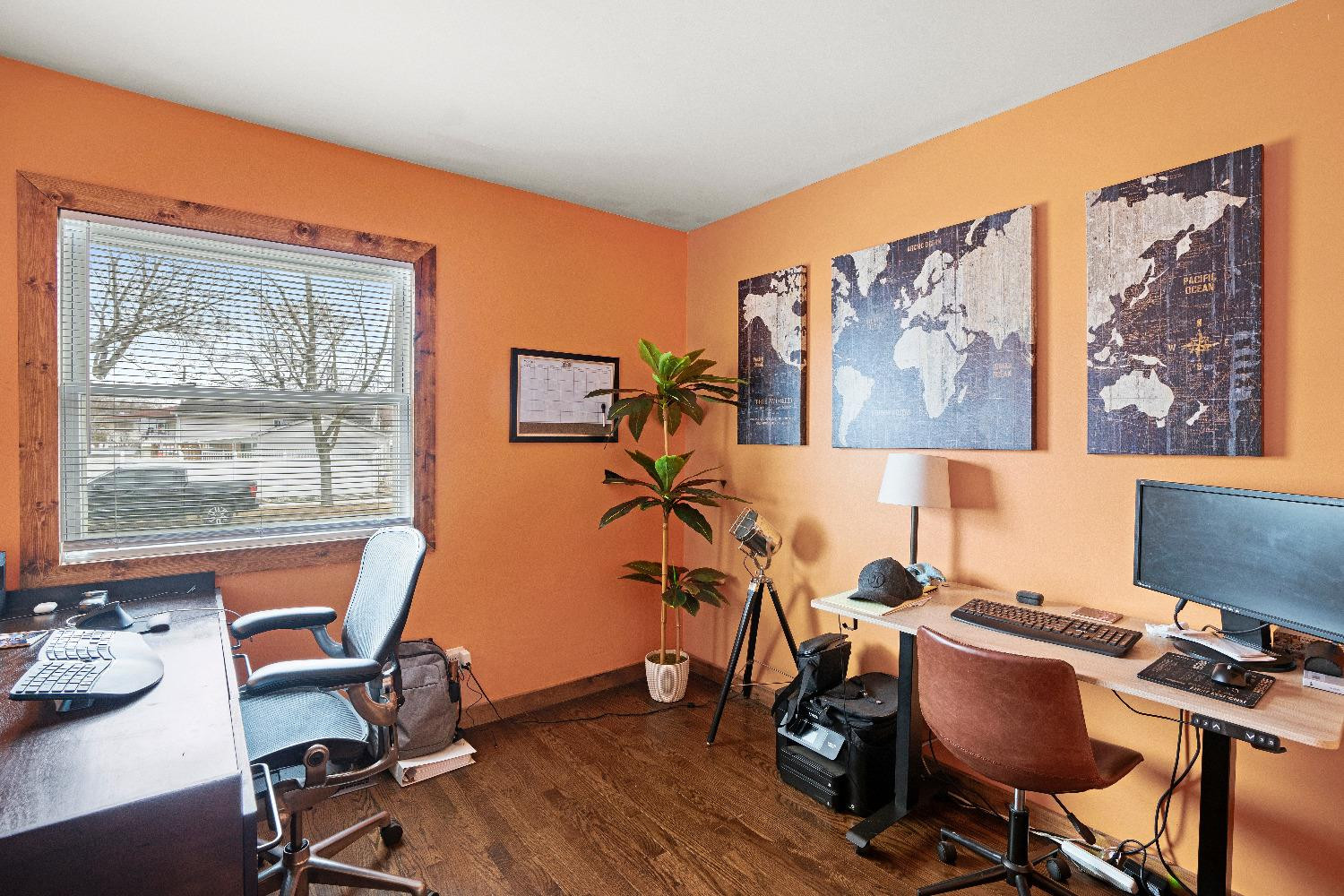 1412 North Elmer Street Griffith, IN 46319 - Photo 11 of 23 a view of a workspace with furniture and a window