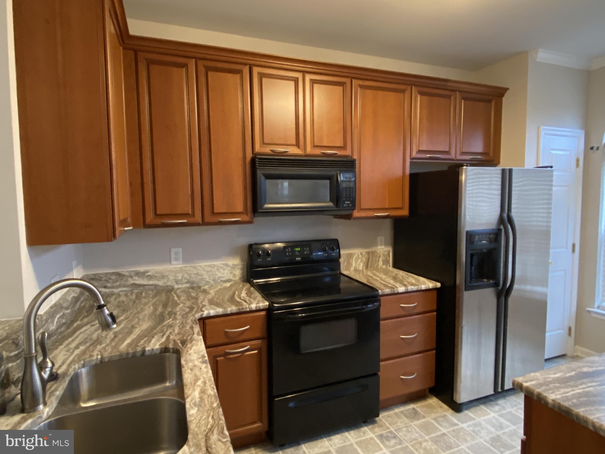 5 Sycamore Lane Bear, DE 19701 - Photo 13 of 38 Kitchen w/ Granite Counters & Updated Cabinets