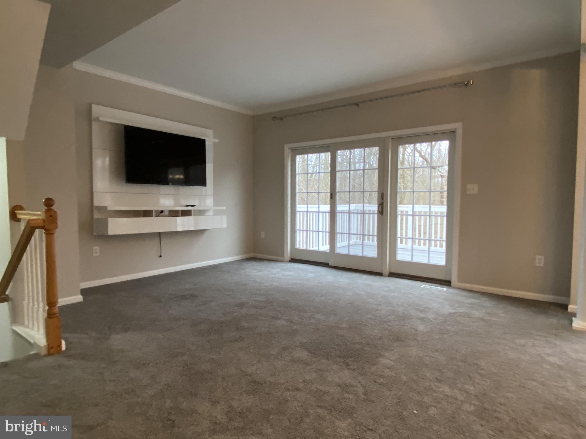 5 Sycamore Lane Bear, DE 19701 - Photo 5 of 38 Good Size Living Room w/ Sliders to 2nd Fl Deck