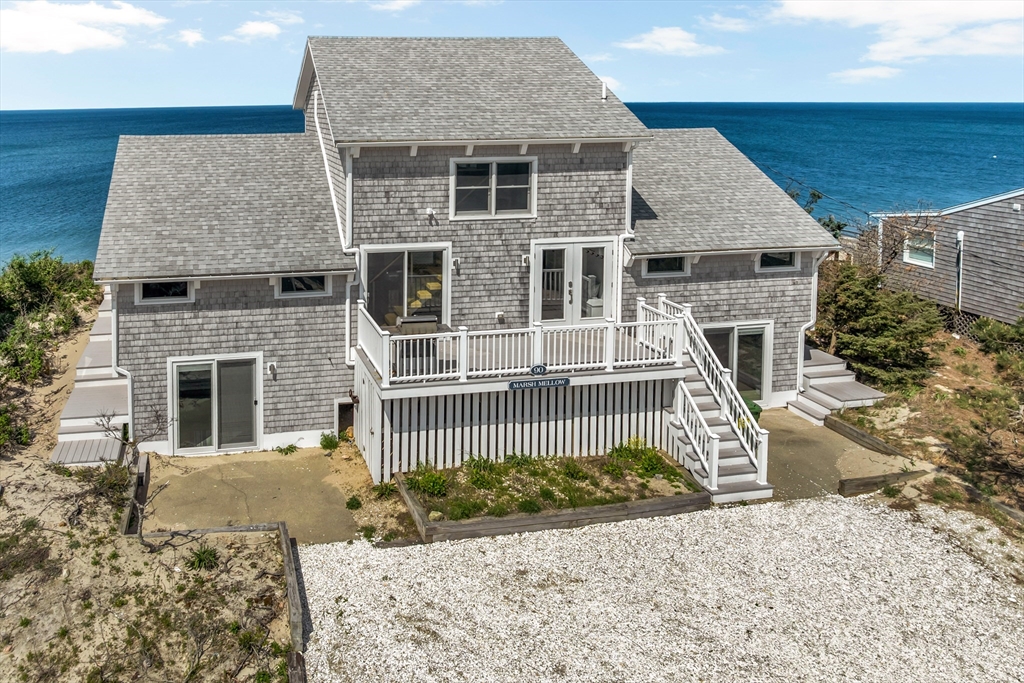 90 Salt Marsh Road East Sandwich, MA 02537 - Photo 8 of 40 front view of a house with a yard