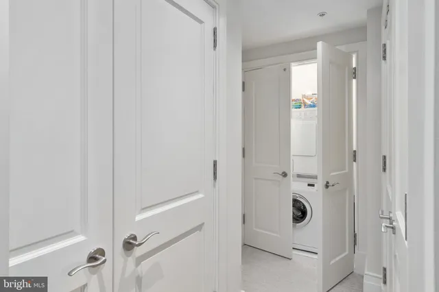 a bathroom with a granite countertop tub sink toilet and shower