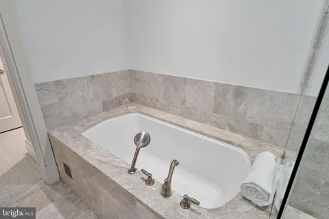 a front view of a building with glass windows