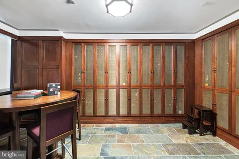 a view of a living room and entryway